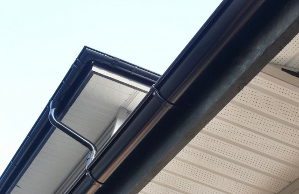Black Lindab Gutters and Downpipe